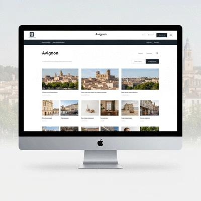 Modern business website on a desktop computer showing a clean design and services, with Avignon in the background, no text, no words, no typography, no labels, clean image